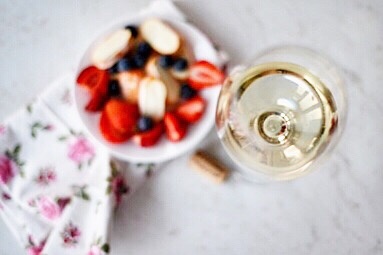 white wine with fruit bowl